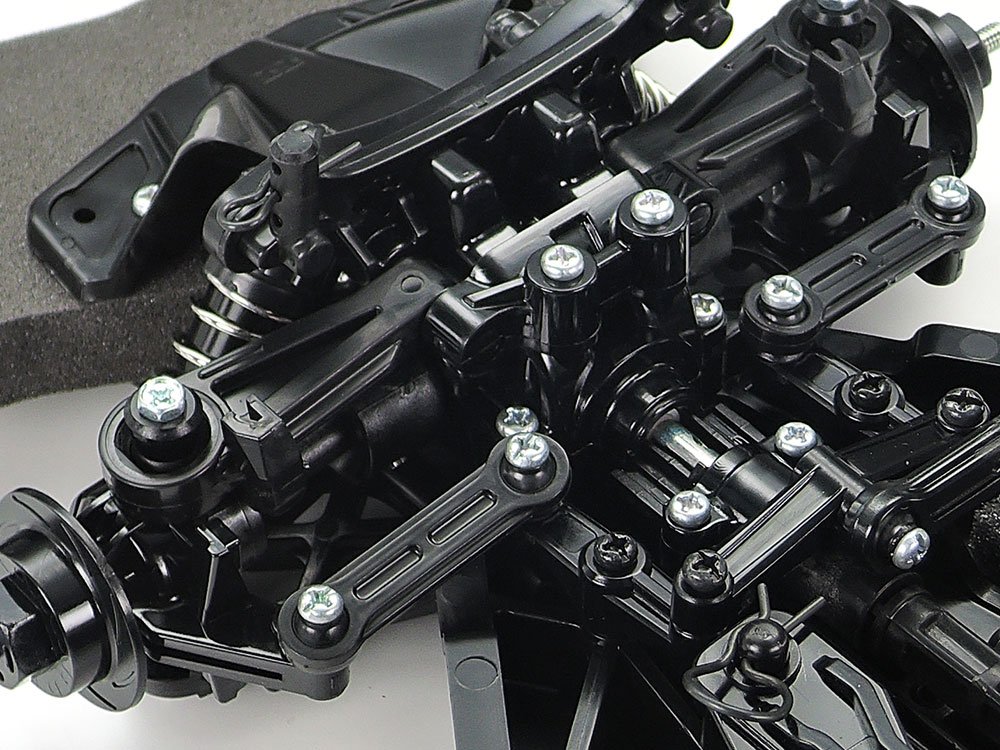 a black machine with many bolts shocks