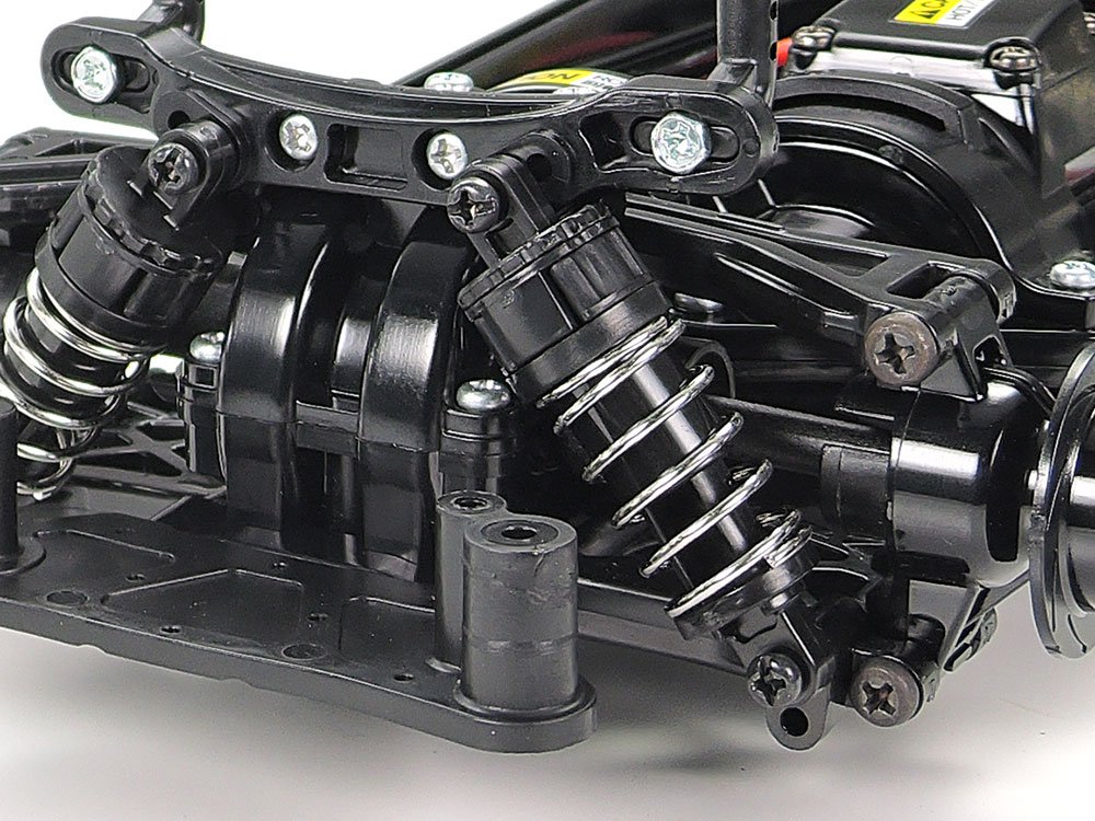 a black metal object with metal springs